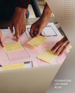 Image of two peoples hands working with sticky notes. This image is introducing the blog Nonprofit Marketing Tactics That Revolutionarily Grow Organizational Awareness