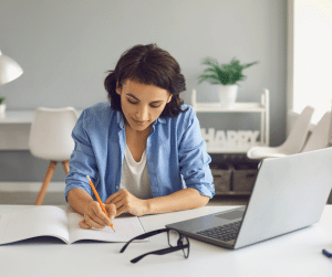 Human Resources-Training Guide for HR, Talent Acquisition & Recruiting. Image of person working at a computer learning.