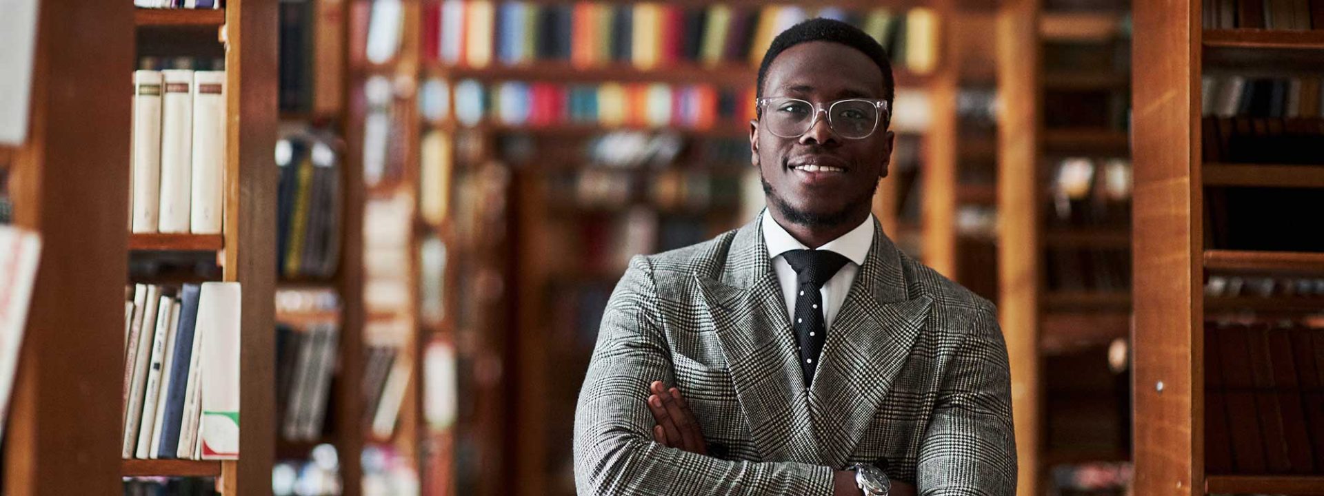 Image of nonprofit job seeker at Foundation List Nonprofit Job Board smiling wearing a suit