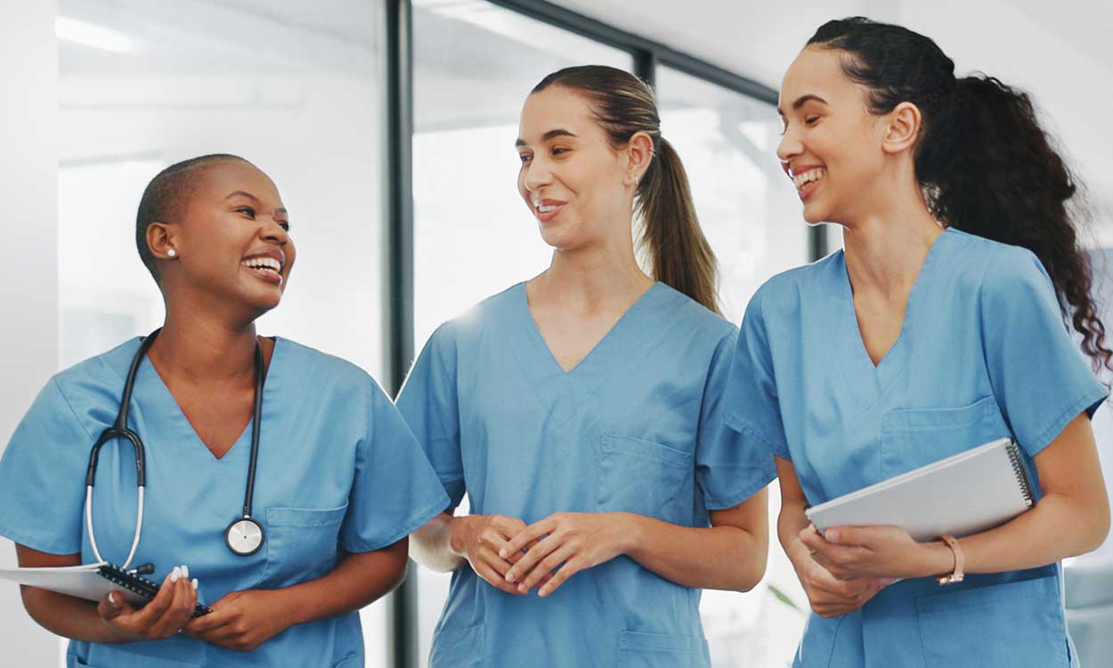 Three nurses smiling