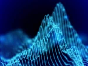 Abstract lines showing business cycles can be seen in blue