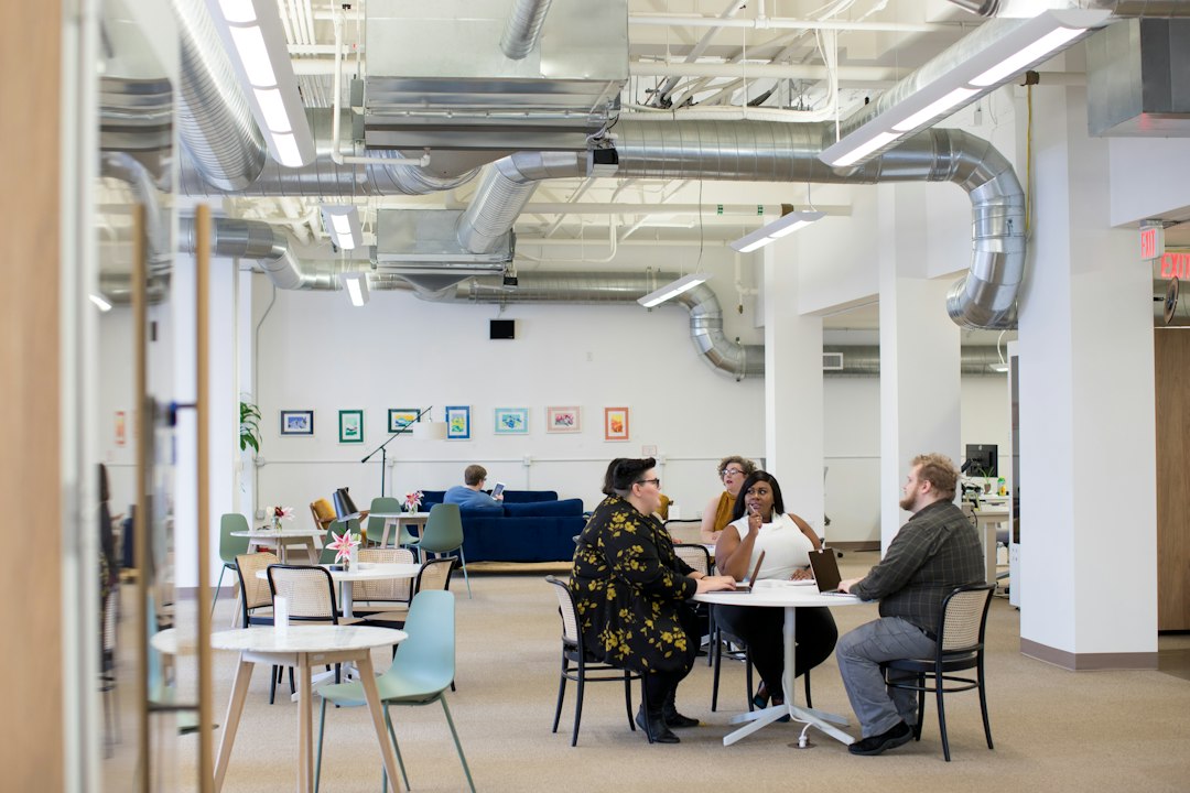 Animal welfare organization staff collaborating in a modern office environment