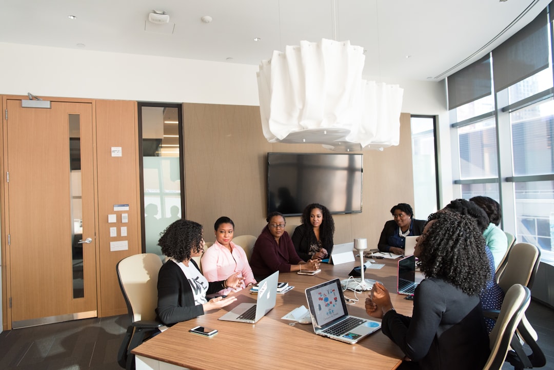 Fundraising professionals discussing relationship strategy in an office