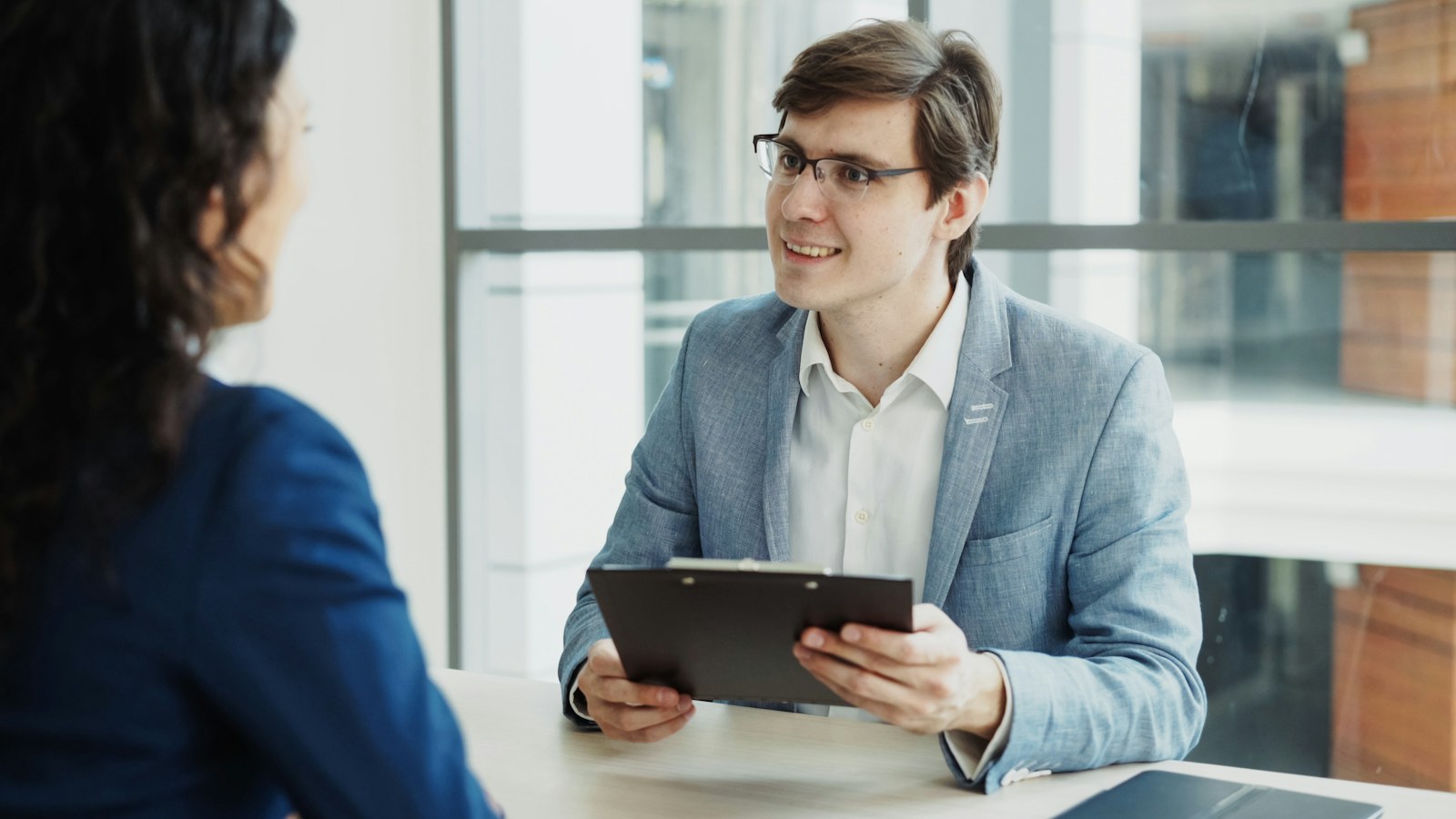 Nonprofit grant writer collaborating with colleagues on a funding proposal