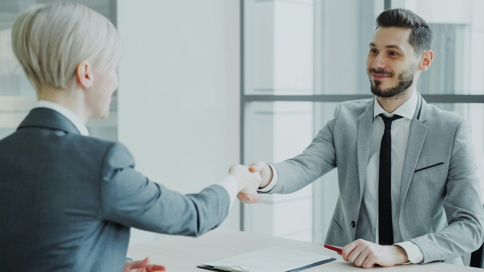 Candidate preparing for a nonprofit job interview in an office