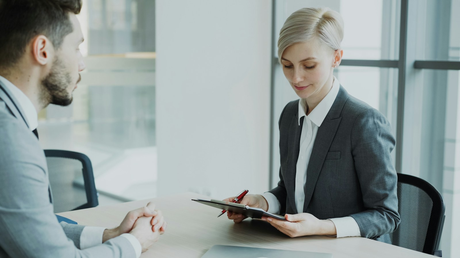 Professional reviewing a nonprofit resume with a career advisor